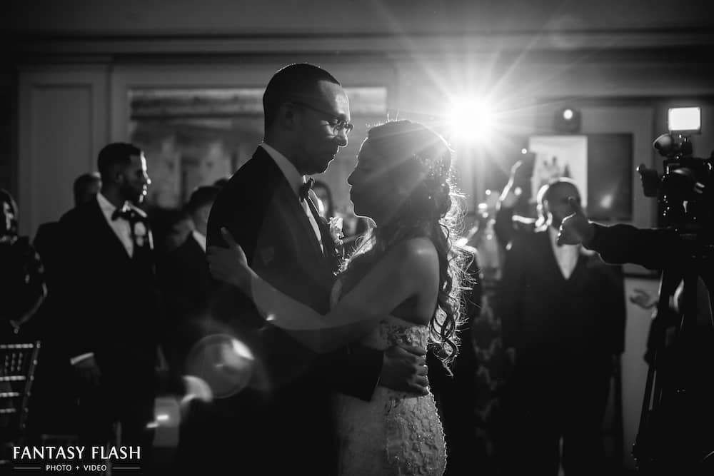 a bride and a groom doing their first dance at New York Country Club