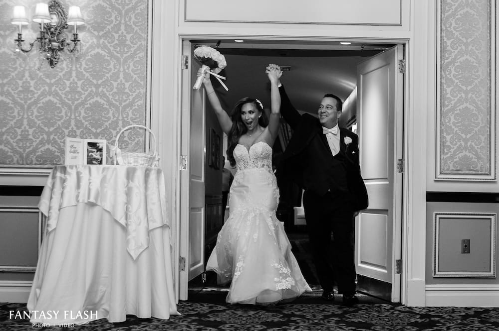 Bride and Groom entering wedding reception at VIP Country Club