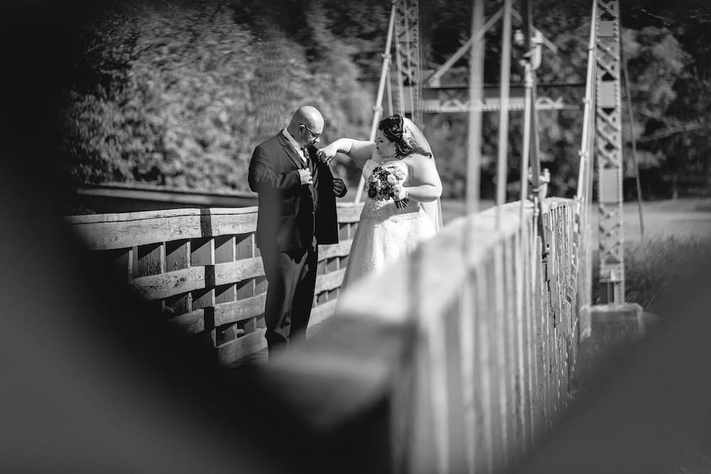 Bride and Groom on Bridge at West Hills Country Club